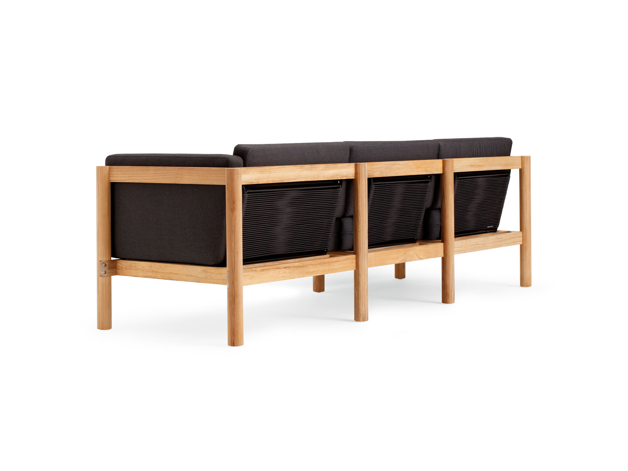 Back angle view of 4-piece outdoor sectional with black arm cushions